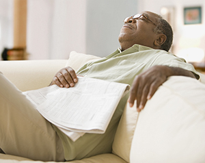 Man sleeping on sofa.